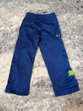 Puma Boys Navy Sweatpants with Neon Green Logo